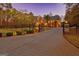 Brick driveway leading to a grand home entrance at 180 Wesley Forest Dr, Fayetteville, GA 30214