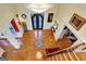 Grand entryway with hardwood floors, chandelier, and ornate door at 180 Wesley Forest Dr, Fayetteville, GA 30214