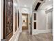 Elegant hallway with hardwood floors and detailed trim at 180 Wesley Forest Dr, Fayetteville, GA 30214