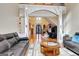 Open living room with a view of the entryway and staircase at 180 Wesley Forest Dr, Fayetteville, GA 30214