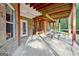 Covered patio with picnic table and bench at 180 Wesley Forest Dr, Fayetteville, GA 30214