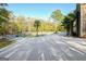 Spacious patio with fountain and wooded backyard at 180 Wesley Forest Dr, Fayetteville, GA 30214