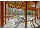 Covered patio with picnic table and bench at 180 Wesley Forest Dr, Fayetteville, GA 30214