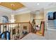 Spacious upper hallway with chandelier and stairs at 180 Wesley Forest Dr, Fayetteville, GA 30214