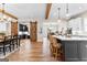 Open-concept design with barn doors leads to a kitchen and dining area for easy entertaining at 0 Pinegate Way, Sharpsburg, GA 30277