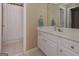 Bathroom with double vanity, shower, and separate tub at 3443 Pinemont Dr, Douglasville, GA 30135