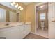 Bathroom with double vanity and toilet in separate room at 3443 Pinemont Dr, Douglasville, GA 30135