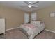 Charming bedroom with a king-size bed and soft color palette at 3443 Pinemont Dr, Douglasville, GA 30135