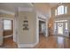 Foyer with hardwood floors, powder room and access to home office at 3443 Pinemont Dr, Douglasville, GA 30135