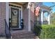 Inviting front entrance with a glass door and wreath at 3443 Pinemont Dr, Douglasville, GA 30135