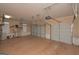 Spacious garage with overhead storage and ample floor space at 3443 Pinemont Dr, Douglasville, GA 30135