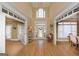 Bright two-story foyer with hardwood floors and views to formal dining room at 3443 Pinemont Dr, Douglasville, GA 30135