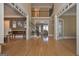 Grand two-story foyer with hardwood floors, staircase, and high ceilings at 3443 Pinemont Dr, Douglasville, GA 30135