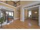 Elegant two-story foyer with hardwood floors and views to the living room at 3443 Pinemont Dr, Douglasville, GA 30135