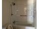 Bathroom with shower/tub combo and shelving at 200 Eleanor Dr, Covington, GA 30016