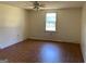 Spacious bedroom with wood floors and window at 200 Eleanor Dr, Covington, GA 30016