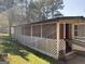 Single story house with screened porch at 200 Eleanor Dr, Covington, GA 30016