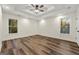 Spacious bedroom with ceiling fan and hardwood floors at 2473 Baker Nw Rd, Atlanta, GA 30318