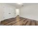 Bedroom with double doors and hardwood floors at 2473 Baker Nw Rd, Atlanta, GA 30318