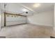 Attached garage with automatic opener and concrete floor at 2473 Baker Nw Rd, Atlanta, GA 30318