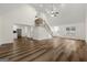 Open concept living room with hardwood floors and a view of the kitchen at 2473 Baker Nw Rd, Atlanta, GA 30318