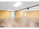 Spacious, open basement with light-colored flooring at 180 Rock Hill Dr, Fayetteville, GA 30215