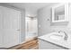 Basement bathroom with walk-in shower and granite vanity at 180 Rock Hill Dr, Fayetteville, GA 30215