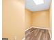 Small, empty basement room with light yellow walls at 180 Rock Hill Dr, Fayetteville, GA 30215