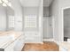 Bathroom with soaking tub, shower, and tile floor at 180 Rock Hill Dr, Fayetteville, GA 30215
