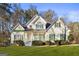 Two-story house with green shutters and a manicured lawn at 180 Rock Hill Dr, Fayetteville, GA 30215