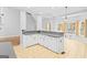 Kitchen with white cabinets, stainless steel appliances and a breakfast bar at 180 Rock Hill Dr, Fayetteville, GA 30215