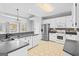 Kitchen with stainless steel appliances and a large island at 180 Rock Hill Dr, Fayetteville, GA 30215