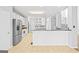 Kitchen with stainless steel appliances and white cabinets at 180 Rock Hill Dr, Fayetteville, GA 30215