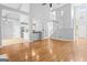 Bright living room with hardwood floors and a staircase at 180 Rock Hill Dr, Fayetteville, GA 30215