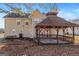 Backyard with a wooden gazebo and a storage shed at 360 Kaleb C, Mcdonough, GA 30252