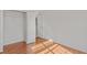 Bright bedroom with hardwood floors and a large closet at 360 Kaleb C, Mcdonough, GA 30252