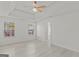 Spacious bedroom with wood-look floors, ceiling fan, and ample natural light at 360 Kaleb C, Mcdonough, GA 30252