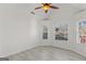 Bedroom with wood-look floors, a ceiling fan, and large windows at 360 Kaleb C, Mcdonough, GA 30252