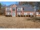 Brick two-story house with a large front yard and attached garage at 360 Kaleb C, Mcdonough, GA 30252