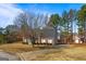 Brick house with mature trees and a large yard at 360 Kaleb C, Mcdonough, GA 30252
