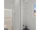Laundry room with shelving and window for natural light at 360 Kaleb C, Mcdonough, GA 30252