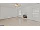 Spacious living room featuring a fireplace and tile floors at 360 Kaleb C, Mcdonough, GA 30252