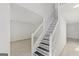 Modern staircase with gray and white tile risers at 360 Kaleb C, Mcdonough, GA 30252