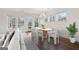 Bright dining room with hardwood floors and chandelier at 615 Grassmeade Ln, Woodstock, GA 30188