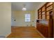 Dining area with built-in cabinetry and hardwood floors at 4487 Berkshire Rd, Forest Park, GA 30297