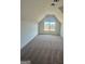 Bright bedroom with a window and carpeted floor at 145 Dockside Dr # 396, Fayetteville, GA 30215