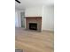 Living room with brick fireplace and hardwood floors at 145 Dockside Dr # 396, Fayetteville, GA 30215