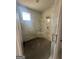 Walk-in shower with marble tile and glass enclosure at 145 Dockside Dr # 396, Fayetteville, GA 30215