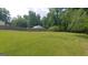 Large backyard with soccer goal and trees at 2477 Briar Valley Way, Dacula, GA 30019