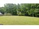 Large backyard with grassy area and soccer goal at 2477 Briar Valley Way, Dacula, GA 30019